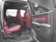 2016 Ram 1500 Rebel z VIN 1C6RR7YT2GS216684, wystawiony jako IAAI lot #41892815 z przebiegiem 79 648 mil mil oraz . Historia ofert i sprzedaży dostępna na DreamBid. Obrazek 8.