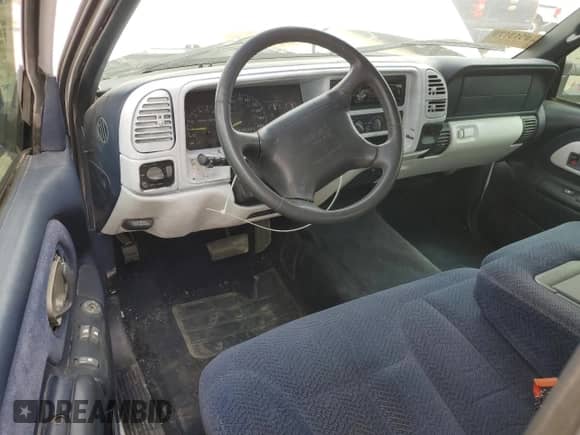 1997 GMC Sierra 1500 z VIN 2GTEC19R0V1553263, wystawiony jako Copart lot #52783805 z przebiegiem 230 959 mil mil oraz Szkoda całkowita • Salvage title. Historia ofert i sprzedaży dostępna na DreamBid. Obrazek 8.