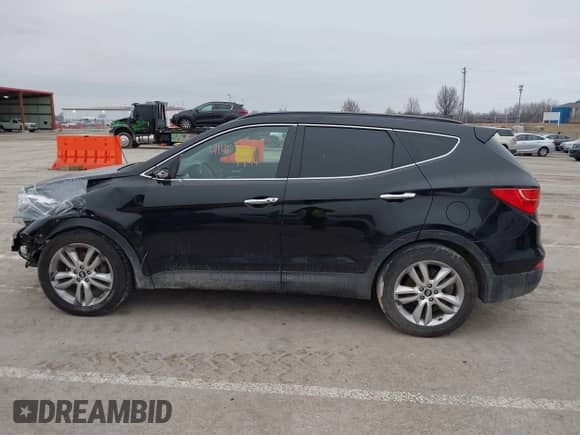 2014 Hyundai Santa Fe с VIN 5XYZUDLA5EG156754, выставлен на аукционе IAAI как лот 41469744 с пробегом 155 675 миль миль и . История ставок и продаж доступна на DreamBid. Изображение 14.