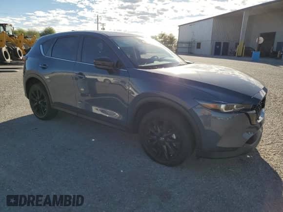 2024 Mazda CX-5 S Carbon Edition z VIN JM3KFBCM6R0350318, wystawiony jako Copart lot #85782105 z przebiegiem 30 350 mil mil oraz Szkoda całkowita • Salvage title. Historia ofert i sprzedaży dostępna na DreamBid. Obrazek 4.