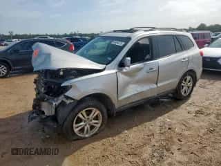 2012 Hyundai Santa Fe Limited с VIN 5XYZK4AG6CG158412, выставлен на аукционе Copart как лот 60856275 с пробегом 85 394 миль миль и Списание • Salvage title. История ставок и продаж доступна на DreamBid. Изображение 1.