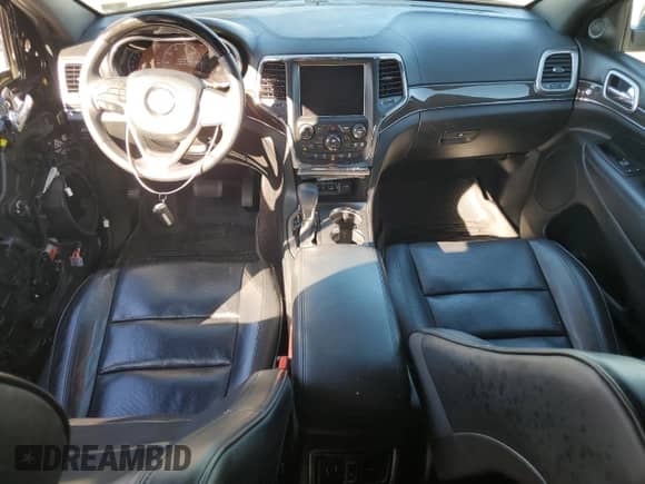2018 Jeep Grand Cherokee Overland with VIN 1C4RJFCG1JC326051, listed as a Copart auction lot 83996975 with 94,418 mi miles and Salvage title. Bid and sale history available at DreamBid. Image 8.