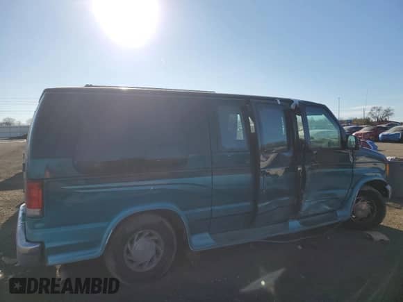 1999 Ford Econoline Cargo Recreational with VIN 1FDRE14L6XHC18387, listed as a Copart auction lot 46744285 with 138,588 mi miles and Salvage title. Bid and sale history available at DreamBid. Image 3.