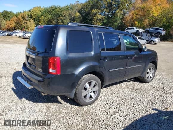 2014 Honda Pilot Touring с VIN 5FNYF4H96EB029488, выставлен на аукционе Copart как лот 87021855 с пробегом 94 662 миль миль и Чистый • Clean title. История ставок и продаж доступна на DreamBid. Изображение 3.