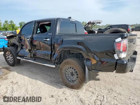 2023 Toyota Tacoma Limited с VIN 3TMEZ5CN7PM204446, выставлен на аукционе Copart как лот 67068615 с пробегом 43 738 миль миль и Списание • Salvage title. История ставок и продаж доступна на DreamBid. Изображение 2.