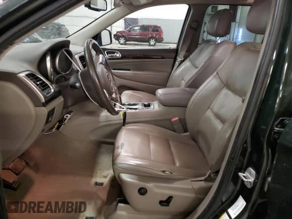 2011 Jeep Grand Cherokee 70th Anniversary z VIN 1J4RR4GT3BC736981, wystawiony jako Copart lot #49171525 z przebiegiem 127 438 mil mil oraz Szkoda całkowita • Salvage title. Historia ofert i sprzedaży dostępna na DreamBid. Obrazek 7.