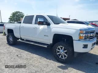 2018 Chevrolet Silverado 2500HD High Country с VIN 1GC1KXEY0JF201191, выставлен на аукционе IAAI как лот 41974099 с пробегом 158 256 миль миль и . История ставок и продаж доступна на DreamBid. Изображение 1.