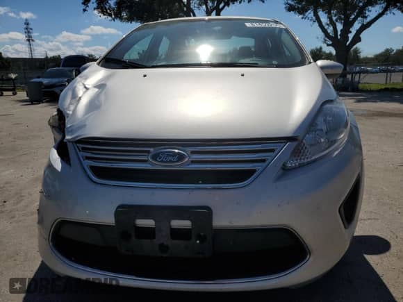 2012 Ford Fiesta SE с VIN 3FADP4BJ6CM169991, выставлен на аукционе Copart как лот 81459255 с пробегом 19 614 миль миль и Списание • Salvage title. История ставок и продаж доступна на DreamBid. Изображение 5.
