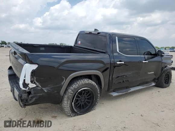 2023 Toyota Tundra Limited Hybrid with VIN 5TFJC5DB7PX019019, listed as a Copart auction lot 55318985 with 50,721 mi miles and Salvage title. Bid and sale history available at DreamBid. Image 3.
