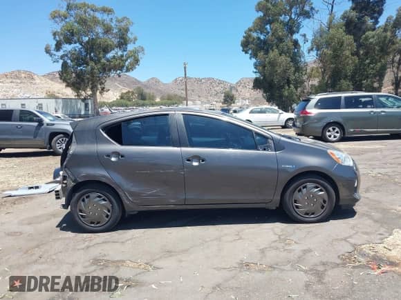 2014 Toyota Prius One with VIN JTDKDTB32E1567575, listed as a IAAI auction lot 42817240 with 194,670 mi miles and . Bid and sale history available at DreamBid. Image 14.