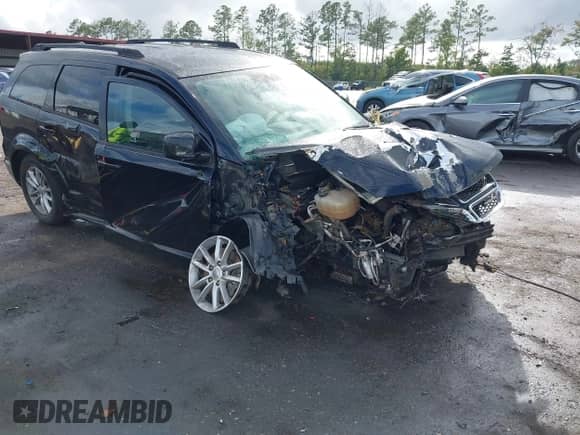 2015 Dodge Journey SXT with VIN 3C4PDCBGXFT649346, listed as a IAAI auction lot 43331826 with 103,169 mi miles and . Bid and sale history available at DreamBid. Image 1.