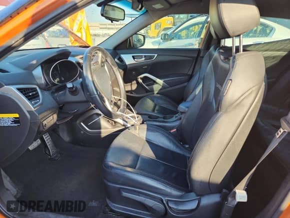 2015 Hyundai Veloster with VIN KMHTC6AD3FU219198, listed as a Copart auction lot 81516035 with 77,510 mi miles and Salvage title. Bid and sale history available at DreamBid. Image 7.