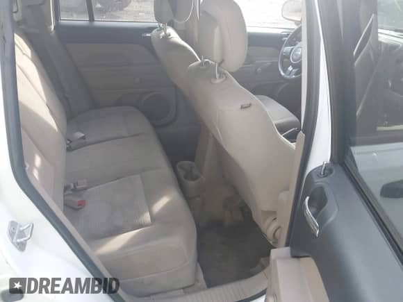 2014 Jeep Compass Sport with VIN 1C4NJCBA0ED887710, listed as a IAAI auction lot 43410841 with 127,978 mi miles and . Bid and sale history available at DreamBid. Image 8.