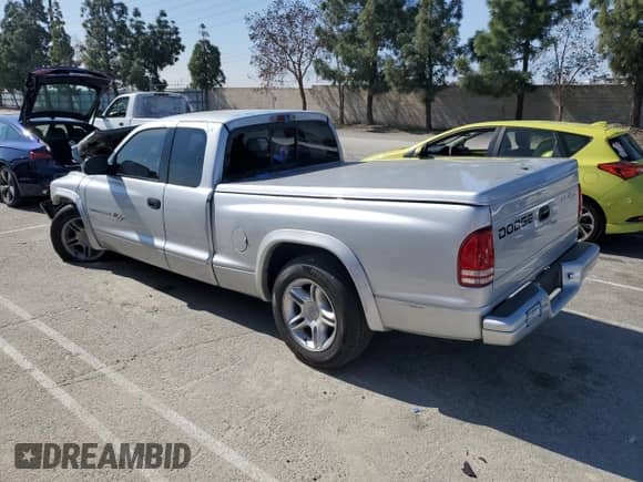 2002 Dodge Dakota with VIN 1B7GL32Z42S538632, listed as a Copart auction lot 44578645 with 225,952 mi miles and Salvage title. Bid and sale history available at DreamBid. Image 2.