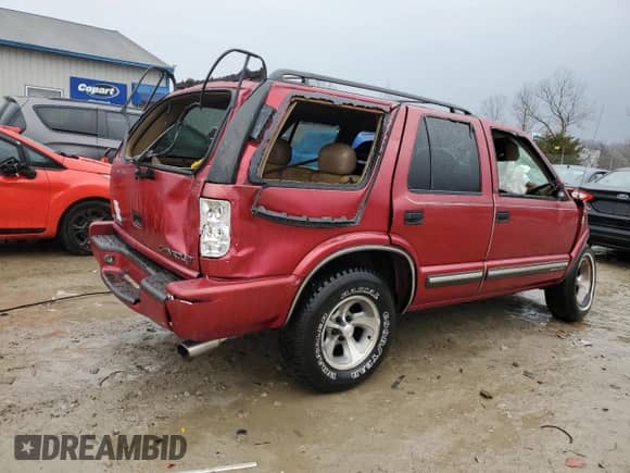 2000 Chevrolet Blazer LS z VIN 1GNCS13W5Y2155227, wystawiony jako Copart lot #43950875 z przebiegiem 153 365 mil mil oraz Nie do naprawy • Non repairable. Historia ofert i sprzedaży dostępna na DreamBid. Obrazek 3.