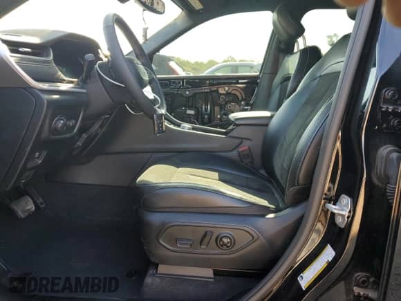 2023 Jeep Grand Cherokee Laredo with VIN 1C4RJHAG3PC565513, listed as a Copart auction lot 69760425 with 15,093 mi miles and Salvage title. Bid and sale history available at DreamBid. Image 7.