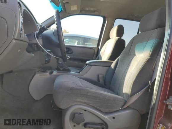 2004 Chevrolet TrailBlazer LS с VIN 1GNDT13S942292762, выставлен на аукционе Copart как лот 77975024 с пробегом 179 700 миль миль и На запчасти • Non repairable. История ставок и продаж доступна на DreamBid. Изображение 7.