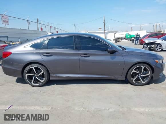 2019 Honda Accord Sport z VIN 1HGCV1F34KA081850, wystawiony jako IAAI lot #43281205 z przebiegiem 77 971 mil mil oraz . Historia ofert i sprzedaży dostępna na DreamBid. Obrazek 13.