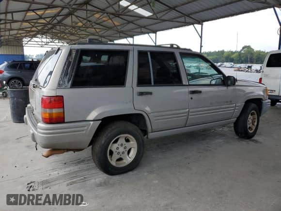 1998 Jeep Grand Cherokee с VIN 1J4FX48S6WC281757, выставлен на аукционе Copart как лот 67815185 с пробегом 201 858 миль миль и Списание • Salvage title. История ставок и продаж доступна на DreamBid. Изображение 3.