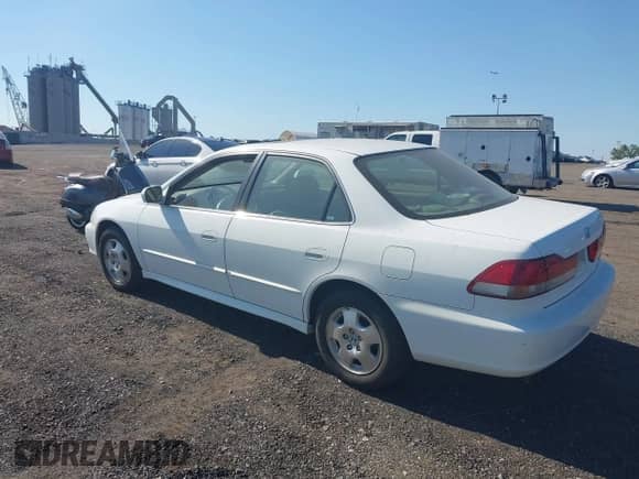 2002 Honda Accord EX with VIN 1HGCG16542A083612, listed as a IAAI auction lot 43047598 with 84,631 mi miles and . Bid and sale history available at DreamBid. Image 3.