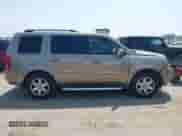 2009 Honda Pilot Touring with VIN 5FNYF38809B004142, listed as a IAAI auction lot 42337103 with 152,874 mi miles and . Bid and sale history available at DreamBid. Image 13.