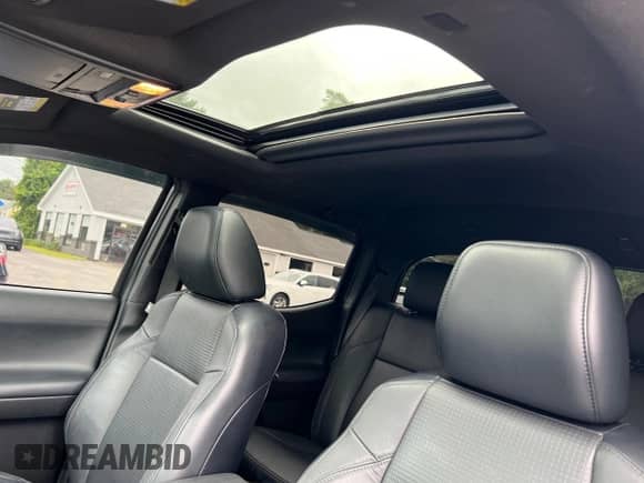 2022 Toyota Tacoma Limited с VIN 3TMGZ5AN7NM458988, выставлен на аукционе Copart как лот 65398105 с пробегом 32 115 миль миль и Списание • Salvage title. История ставок и продаж доступна на DreamBid. Изображение 10.