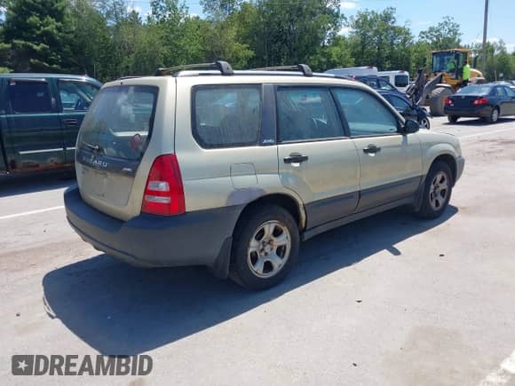 2003 Subaru Forester X with VIN JF1SG63653H762260, listed as a IAAI auction lot 42822727 with 142,236 mi miles and . Bid and sale history available at DreamBid. Image 4.
