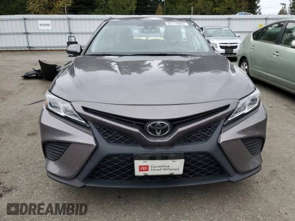 2019 Toyota Camry SE z VIN 4T1B11HK0KU207285, wystawiony jako Copart lot #82714065 z przebiegiem 57 939 mil mil oraz Szkoda całkowita • Salvage title. Historia ofert i sprzedaży dostępna na DreamBid. Obrazek 5.