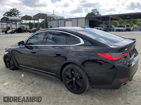 2023 BMW i4 eDrive40 с VIN WBY73AW03PFR43461, выставлен на аукционе Copart как лот 56274855 с пробегом 22 858 миль миль и Списание • Salvage title. История ставок и продаж доступна на DreamBid. Изображение 2.