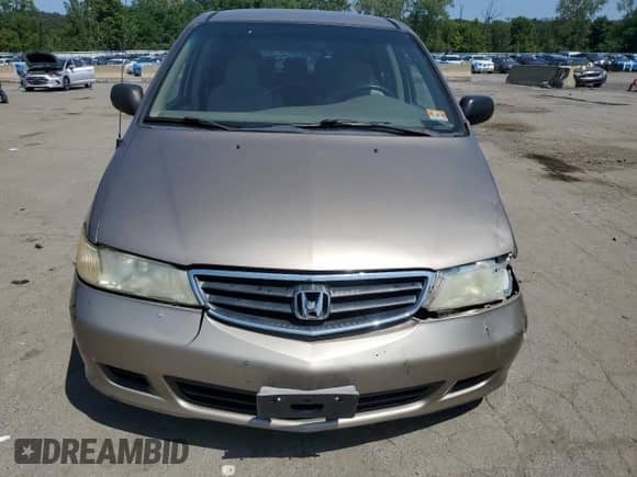 2004 Honda Odyssey LX with VIN 5FNRL18534B143388, listed as a Copart auction lot 68346135 with 160,563 mi miles and Salvage title. Bid and sale history available at DreamBid. Image 5.