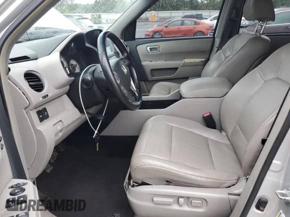 2009 Honda Pilot Touring with VIN 5FNYF38839B027611, listed as a Copart auction lot 67812505 with 148,357 mi miles and Salvage title. Bid and sale history available at DreamBid. Image 7.