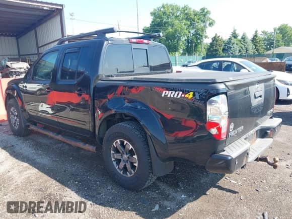 2016 Nissan Frontier S z VIN 1N6AD0EVXGN705086, wystawiony jako IAAI lot #42425274 z przebiegiem 110 614 mil mil oraz . Historia ofert i sprzedaży dostępna na DreamBid. Obrazek 3.