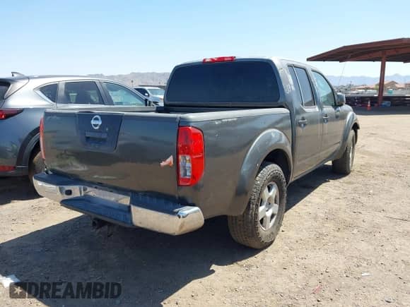 2007 Nissan Frontier SE with VIN 1N6AD07U07C453204, listed as a IAAI auction lot 42454063 with 293,398 mi miles and . Bid and sale history available at DreamBid. Image 4.