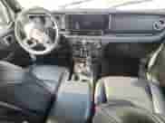 2024 Jeep Wrangler Sahara with VIN 1C4RJXP63RW215504, listed as a Copart auction lot 60795235 with 13,631 mi miles and Salvage title. Bid and sale history available at DreamBid. Image 8.