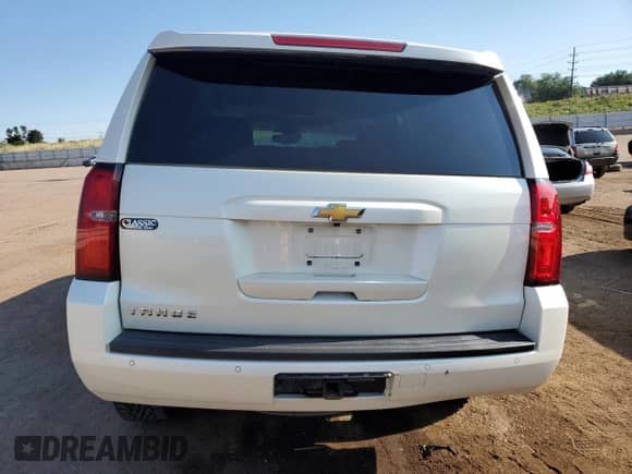 2015 Chevrolet Tahoe LT с VIN 1GNSCBKC6FR123204, выставлен на аукционе Copart как лот 64880915 с пробегом 115 285 миль миль и Списание • Salvage title. История ставок и продаж доступна на DreamBid. Изображение 6.