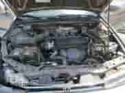 1993 Honda Accord z VIN 1HGCB7658PA049875, wystawiony jako Copart lot #62343865 z przebiegiem 127 404 mil mil oraz Szkoda całkowita • Salvage title. Historia ofert i sprzedaży dostępna na DreamBid. Obrazek 11.