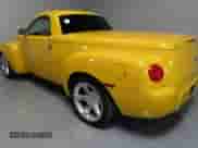 2003 Chevrolet SSR LS with VIN 1GCES14P73B101932, listed as a Copart auction lot 64489295 with 33,422 mi miles and Salvage title. Bid and sale history available at DreamBid. Image 4.