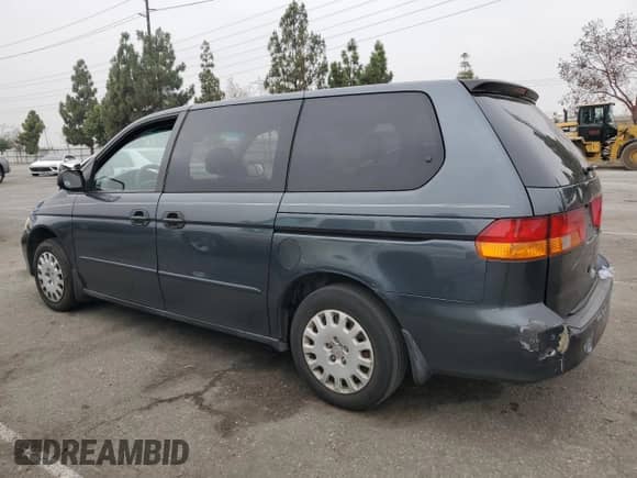 2004 Honda Odyssey LX with VIN 5FNRL18574B137609, listed as a Copart auction lot 68292805 with 172,873 mi miles and Salvage title. Bid and sale history available at DreamBid. Image 2.