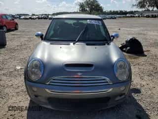 2006 MINI Hardtop S with VIN WMWRE335X6TJ40269, listed as a Copart auction lot 62719735 with 96,215 mi miles and Salvage title. Bid and sale history available at DreamBid. Image 5.