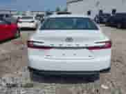 2025 Toyota Camry SE with VIN 4T1DAACKXSU083204, listed as a IAAI auction lot 43116221 with 859 mi miles and . Bid and sale history available at DreamBid. Image 16.