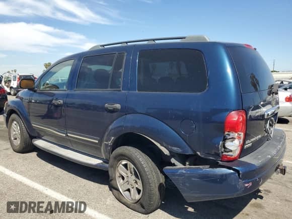 2004 Dodge Durango Limited with VIN 1D4HB58D34F241512, listed as a Copart auction lot 52212475 with 185,791 mi miles and Salvage title. Bid and sale history available at DreamBid. Image 2.