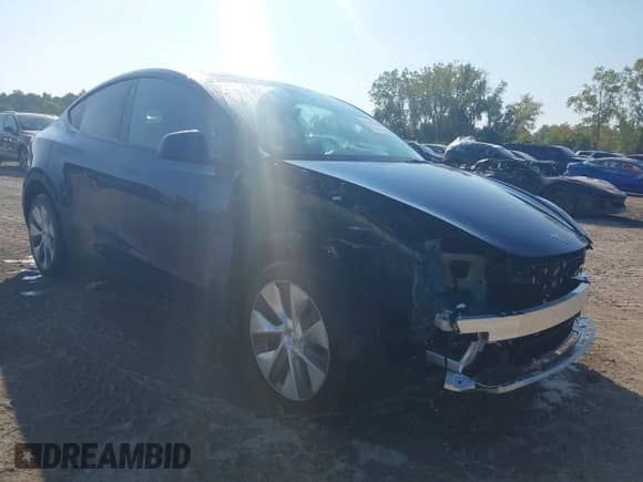 2023 Tesla Model Y Long Range with VIN 7SAYGDEE4PA125024, listed as a IAAI auction lot 43252218 with 21,200 mi miles and . Bid and sale history available at DreamBid. Image 1.