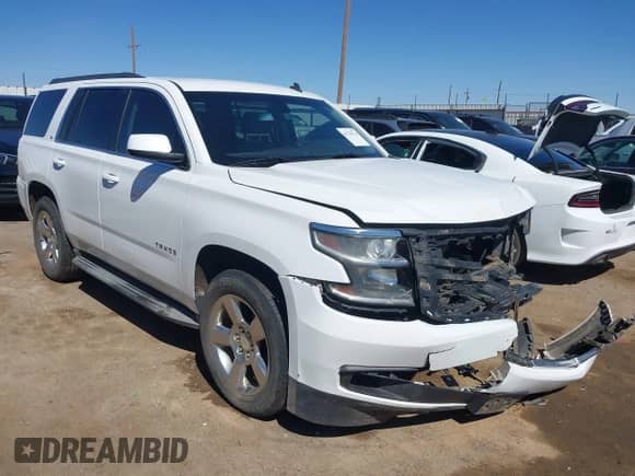2015 Chevrolet Tahoe LS with VIN 1GNSCAKC5FR119378, listed as a IAAI auction lot 41759734 with Not provided miles and . Bid and sale history available at DreamBid. Image 1.