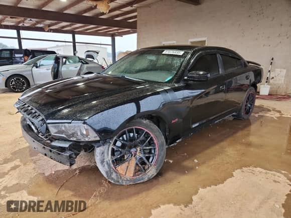2011 Dodge Charger Police с VIN 2B3CL1CT6BH600859, выставлен на аукционе Copart как лот 81675335 с пробегом 162 116 миль миль и Списание • Salvage title. История ставок и продаж доступна на DreamBid. Изображение 1.