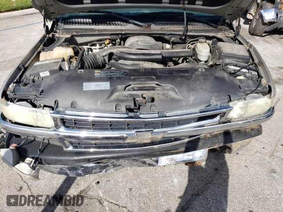 2004 Chevrolet Suburban LT z VIN 3GNEC16ZX4G286084, wystawiony jako Copart lot #72546834 z przebiegiem 250 830 mil mil oraz Szkoda całkowita • Salvage title. Historia ofert i sprzedaży dostępna na DreamBid. Obrazek 12.