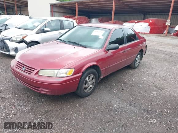 1998 Toyota Camry LE with VIN 4T1BG22K6WU266232, listed as a IAAI auction lot 42388376 with Not provided miles and . Bid and sale history available at DreamBid. Image 2.