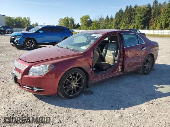 2009 Chevrolet Malibu LTZ with VIN 1G1ZK57729F128454, listed as a Copart auction lot 80680375 with 166,024 mi miles and Salvage title. Bid and sale history available at DreamBid. Image 1.