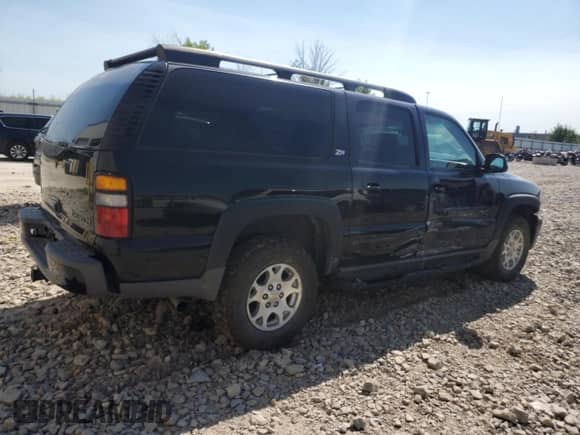 2004 Chevrolet Suburban Z71 z VIN 3GNFK16Z14G148988, wystawiony jako Copart lot #66498805 z przebiegiem 152 229 mil mil oraz Czysty tytuł • Clean title. Historia ofert i sprzedaży dostępna na DreamBid. Obrazek 3.