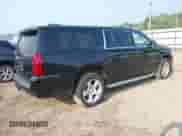 2015 Chevrolet Suburban LTZ z VIN 1GNSKKKC5FR155127, wystawiony jako IAAI lot #42868596 z przebiegiem Nie podano mil oraz . Historia ofert i sprzedaży dostępna na DreamBid. Obrazek 4.