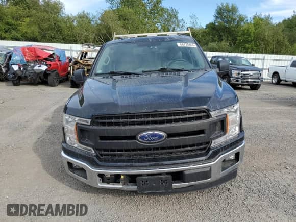 2018 Ford F-150 XL z VIN 1FTMF1CPXJKC90087, wystawiony jako Copart lot #68735865 z przebiegiem 79 711 mil mil oraz Szkoda całkowita • Salvage title. Historia ofert i sprzedaży dostępna na DreamBid. Obrazek 5.
